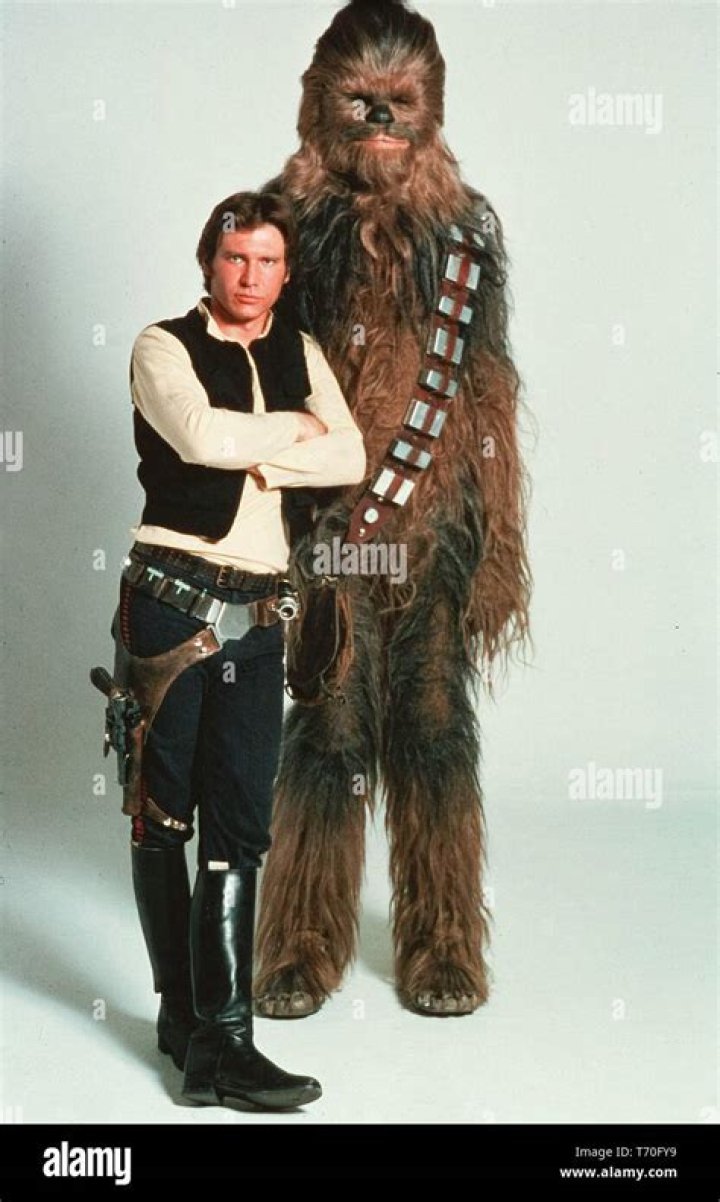 Peter Mayhew and Harrison Ford arriving at the European premiere of "Star Wars - The Force Awakens" in Leicester Square, London (Photo by Zak Hussein/Corbis via Getty Images)