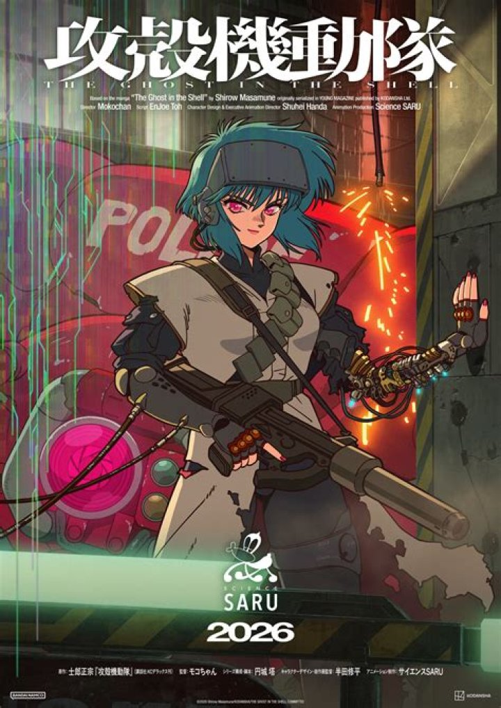 Two characters from Ghost in the Shell are looking down at something.